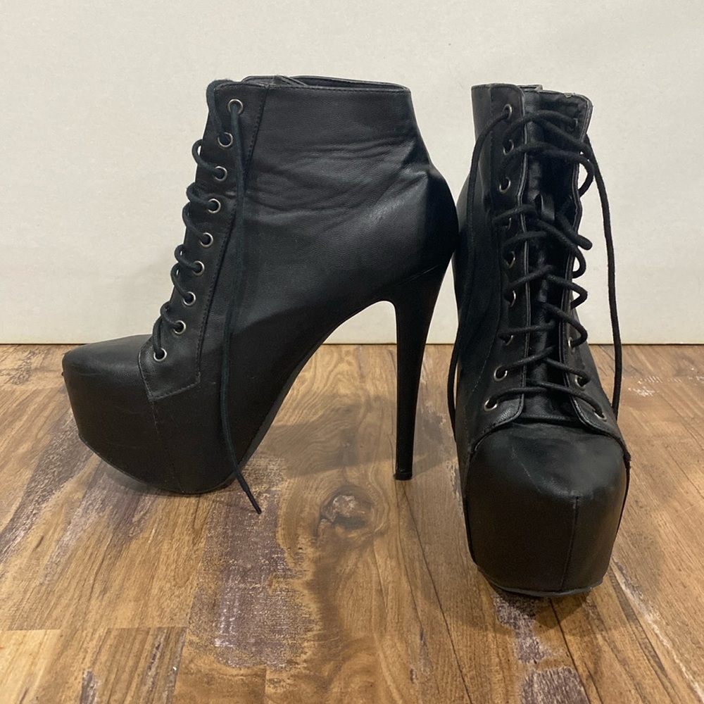 Black lace-up platform stiletto boots